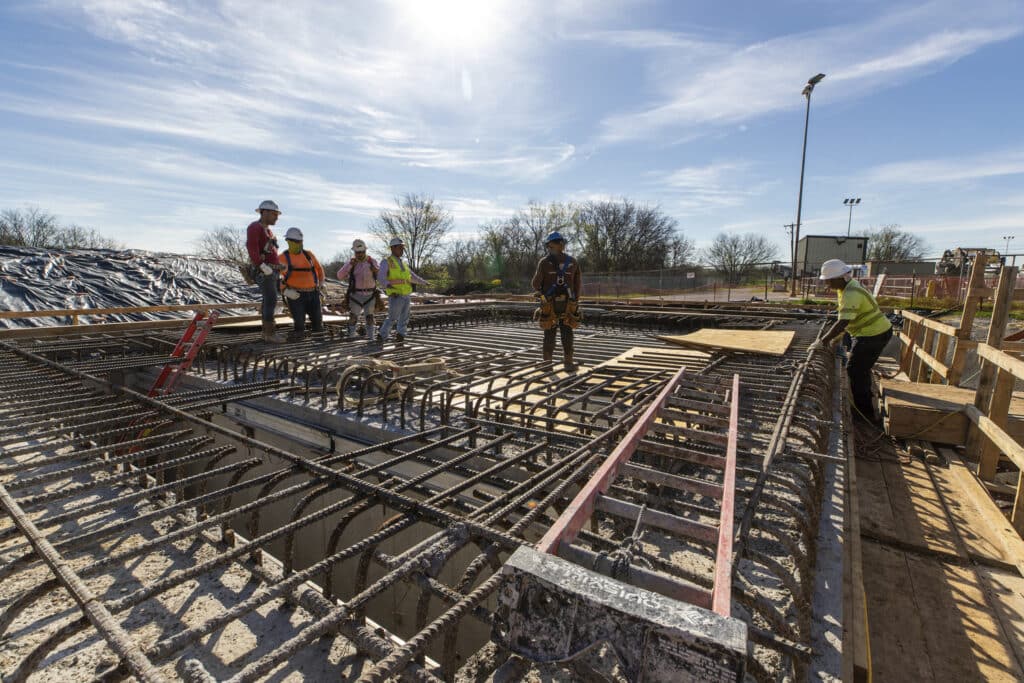 workers laying the foundation of the Stephenville Interceptor