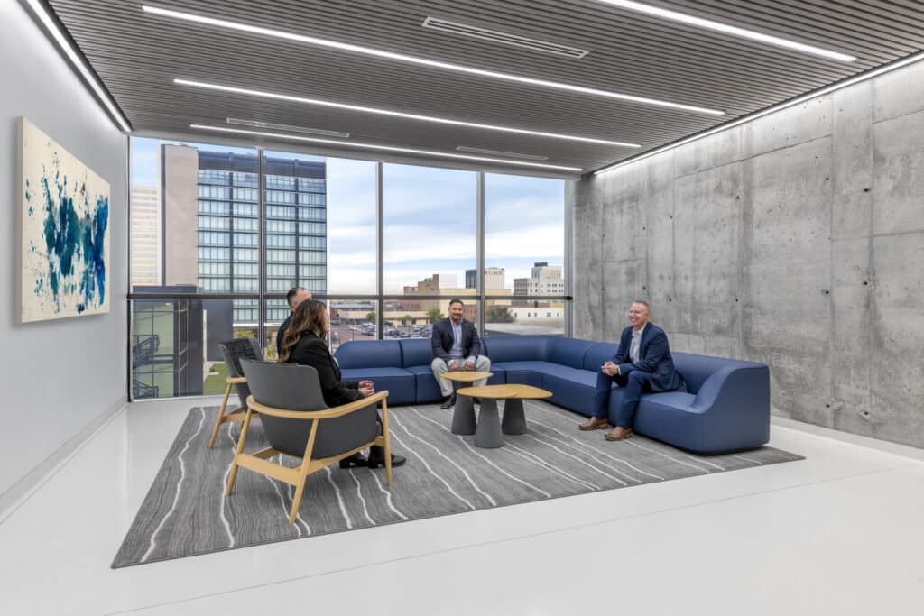 Photo of people sitting in lounge space at Lubbock PD Headquarters