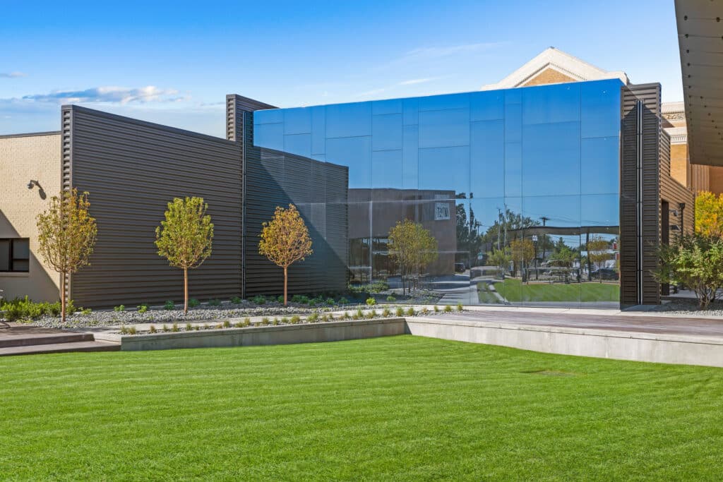 Amarillo College Innovation Outpost building with large glass entrance.
