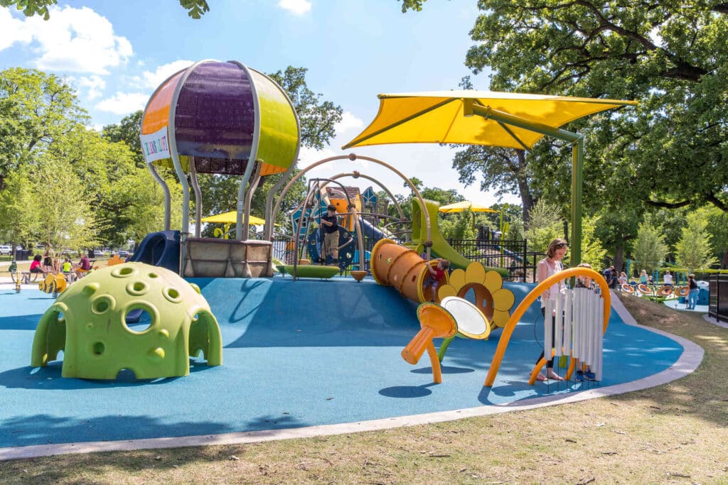 kids playing on a colorful playground at Dream Park
