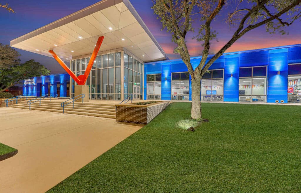 front of Fort Worth ISD Southwest HS at dusk