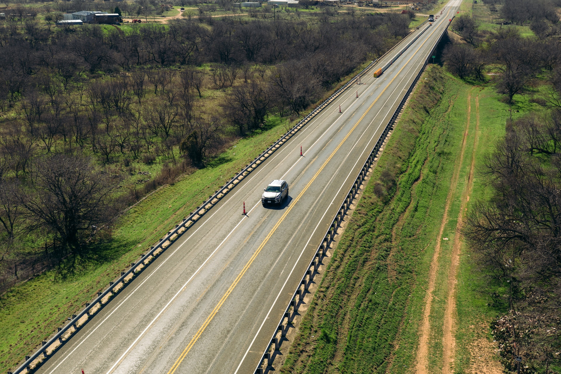 image of a car driving on road